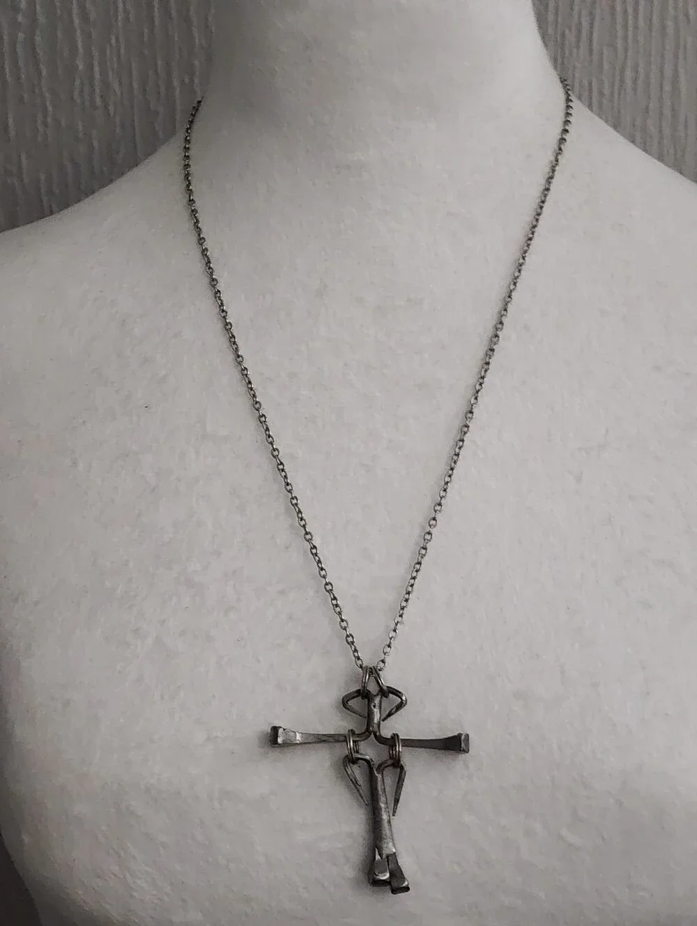 Nail Cross Pendant on a Silvertone Chain